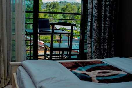 Junior Single Room, Mountain View | Blackout drapes, iron/ironing board, free WiFi