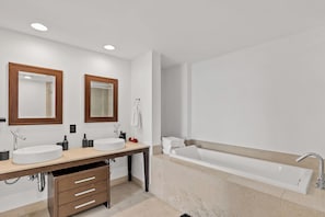 Regadera, secadora de cabello, bidet, toallas 
