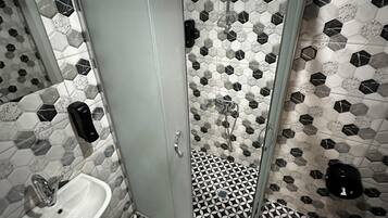 Classic Room | Bathroom | Hair dryer, bathrobes, slippers, towels