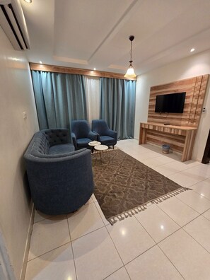 Suite Junior, vue ville | Coin séjour