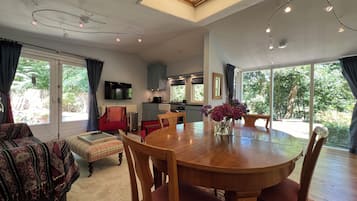 Comfort Apartment | Living area | 80-cm flat-screen TV with cable channels