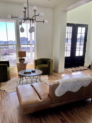 Smart TV, fireplace, table football, books