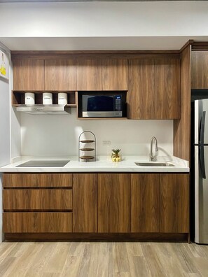 Microwave, stovetop, coffee/tea maker, toaster