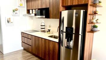 Microwave, stovetop, coffee/tea maker, toaster