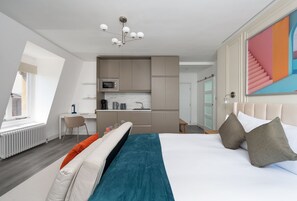 Superior Studio Suite, City View | Desk, laptop workspace, soundproofing, iron/ironing board - YTD Residential (London)