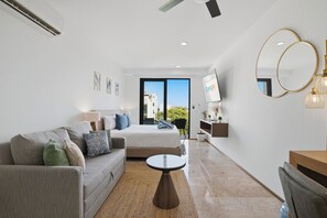 Superior Studio, Balcony, Partial Ocean View | In-room safe, individually decorated, individually furnished