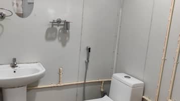 Dutxa, articles de tocador gratuïts, tovalloles i sabó