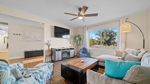 TV connectée, cheminée, jeux vidéo, table de tennis de table