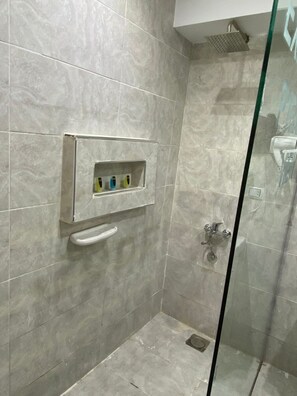 Shower, jetted bath, hair dryer, bidet