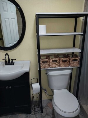 Hair dryer, towels, soap, toilet paper