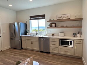 Fridge, microwave, dishwasher, coffee/tea maker