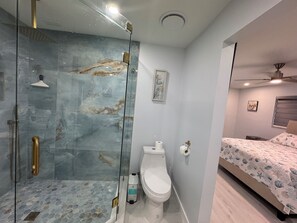 Shower, hair dryer, towels, soap