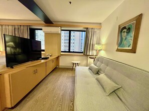 Apartamento conforto | Área de estar | TV