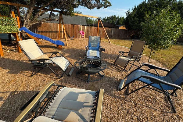 Solar light surrounding S'mores pit and seating next to Custom Tree-House!!