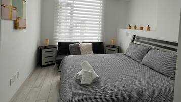 1 habitación, tabla de planchar con plancha y wifi