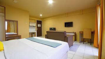 Deluxe Studio Suite, Balcony, City View | Desk, laptop workspace