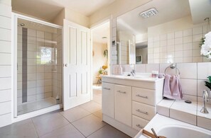 Shower, hair dryer, towels, soap