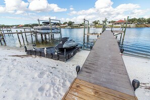 On the beach, sun-loungers