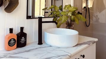 Hair dryer, towels, soap, shampoo