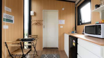 Fridge, microwave, stovetop, coffee/tea maker