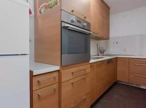 Apartment (Three-Bedroom Apartment) | Private kitchen | Fridge - Apartmani Lucija (Okrug)