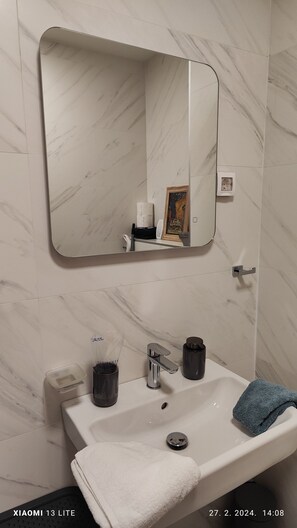 Hair dryer, towels, soap, toilet paper