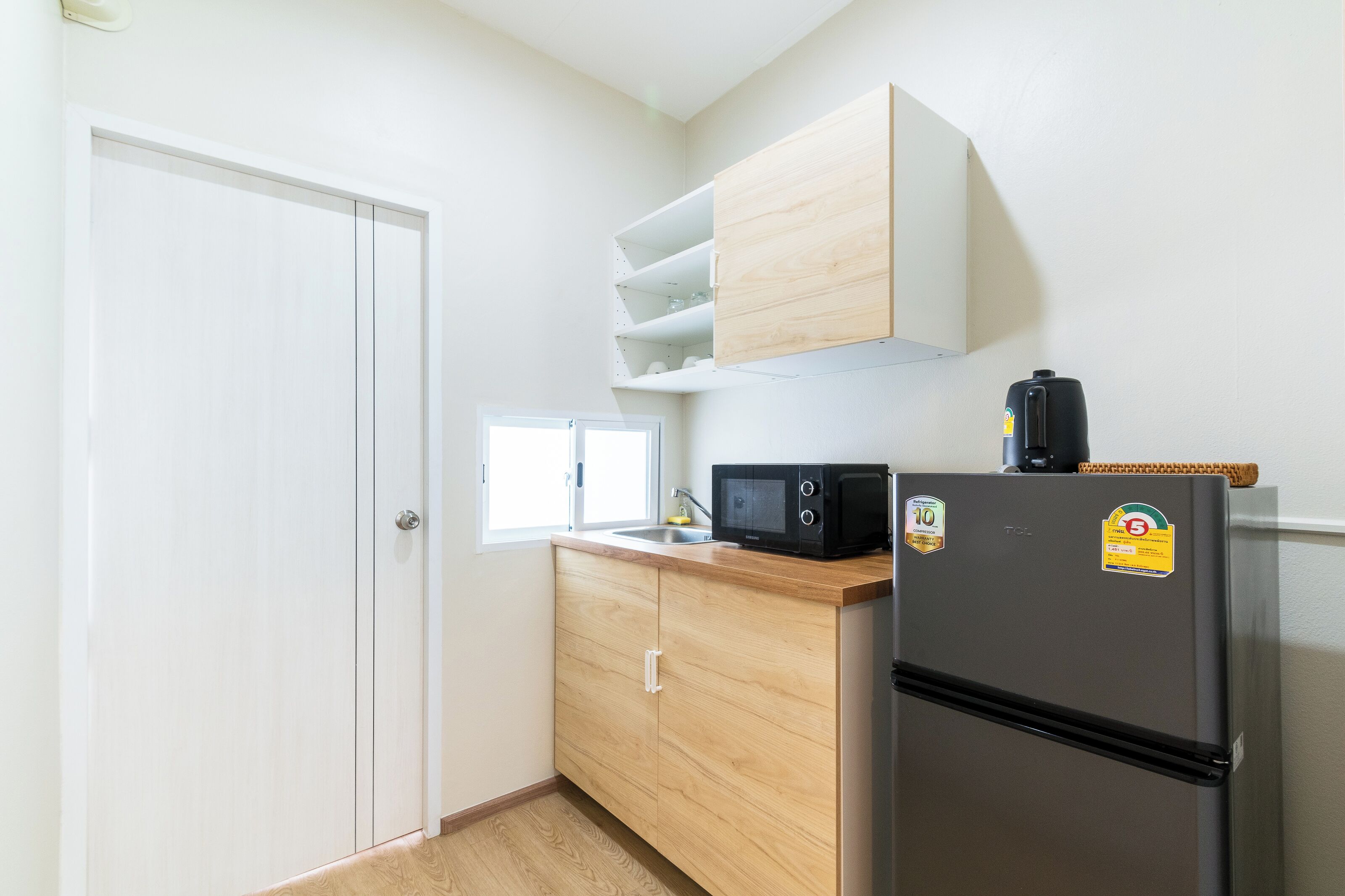 Standard Double Room | Private kitchen | Fridge, microwave, coffee/tea maker, electric kettle