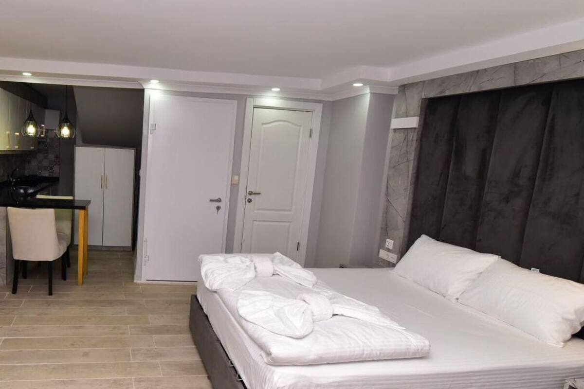 Deluxe Double Room (2 Adults + 1 Child -Basement Floor) | Laptop workspace, iron/ironing board (on request), cribs (free)
