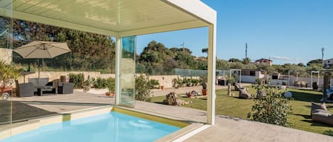 Plant, Sky, Property, Water, Azure, Swimming Pool, Shade, Outdoor Furniture, Architecture, Building