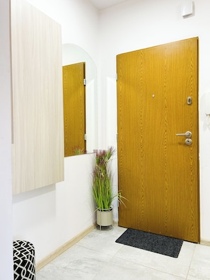 Deluxe Apartment, Balcony, Courtyard View | Living area | 165-cm flat-screen TV with satellite channels, TV, Netflix - Lumina cozy apartment in Lodz (Lódz)