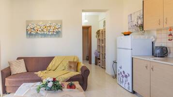 Comfort Apartment, 1 Double Bed with Sofa bed, Sea View | Living area | Flat-screen TV