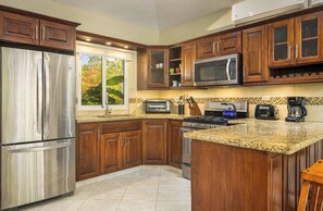 Fridge, microwave, stovetop, cookware/dishes/utensils