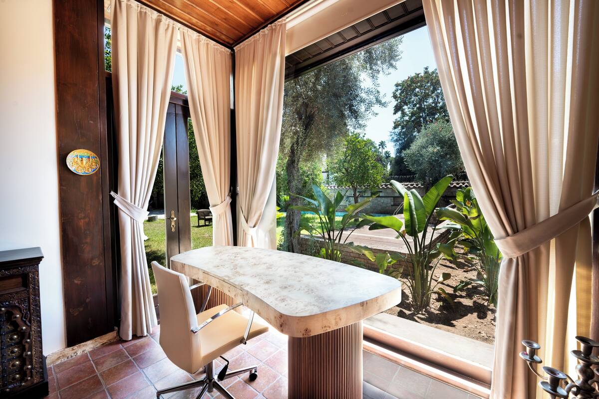 Suite, 1 letto queen, vista giardino | Vista giardino