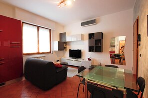 Apartment, Balcony | Living area | Flat-screen TV - Pratovecchio Suite (Florence)
