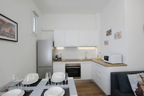 Apartment, Balcony | Private kitchen | Electric kettle, toaster - Casa Giotto (Scandicci)