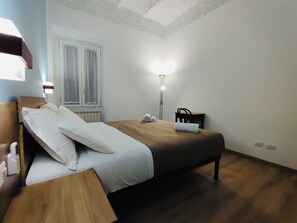 2 habitaciones, tabla de planchar con plancha, wifi y ropa de cama 