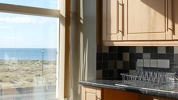 Fridge, microwave, oven, dining tables