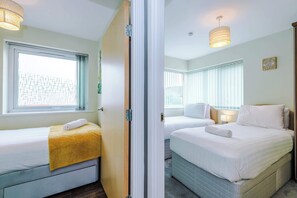 4 bedrooms, desk, iron/ironing board, travel cot