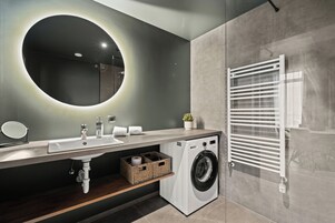 Family Studio Suite, Ocean View | Bathroom | Shower, hair dryer, towels, soap