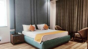 Luxury Suite, Pool View | Premium bedding, desk, laptop workspace, blackout curtains