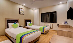 Deluxe Double or Twin Room, City View | Desk, laptop workspace, blackout drapes, iron/ironing board - Hotel Pal Comforts (Golmuri)