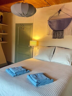 1 bedroom, desk, iron/ironing board, travel crib