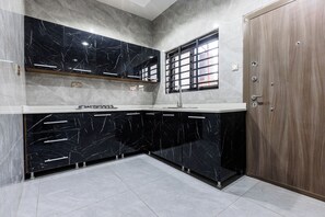 Suite Deluxe, plusieurs lits, vue ville | Cuisine privée