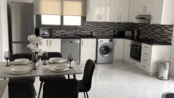 Coffee/tea maker, fridge, microwave, oven