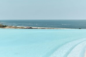 2 outdoor pools, pool umbrellas, sun loungers