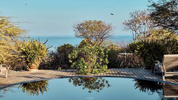 2 outdoor pools, pool umbrellas, sun loungers