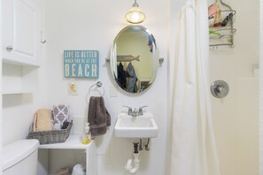 Shower, towels, toilet paper