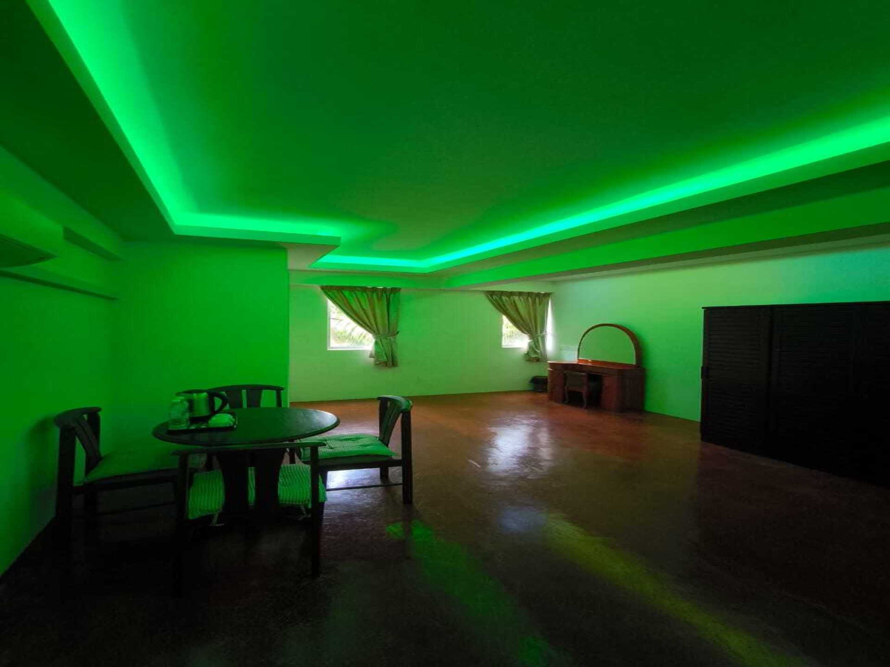 Laptop workspace, bed sheets