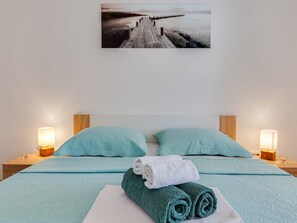 Een kluis op de kamer, gratis wifi, beddengoed