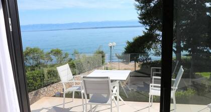 Apartments Marvi - one bedroom apartment with a sea view (Right)